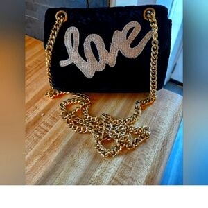 Kurt Geiger vintage love crossbody shoulder bag. Measures 8 by 6.